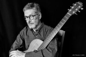 Pierce Pettis performing live music at Dosey Doe in The Woodlands