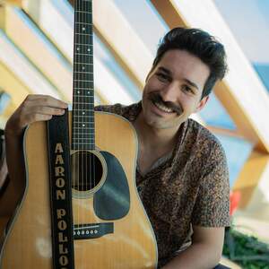 Aaron Pollock performing live music at Dosey Doe in The Woodlands