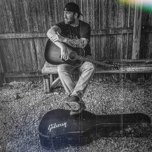 Scott Ryan (of Scott Ryan & the Devilish Folks) performing live music at Dosey Doe in The Woodlands