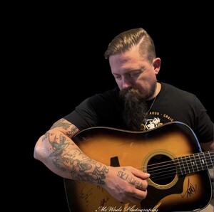 Cooper Wade performing live music at Dosey Doe in The Woodlands